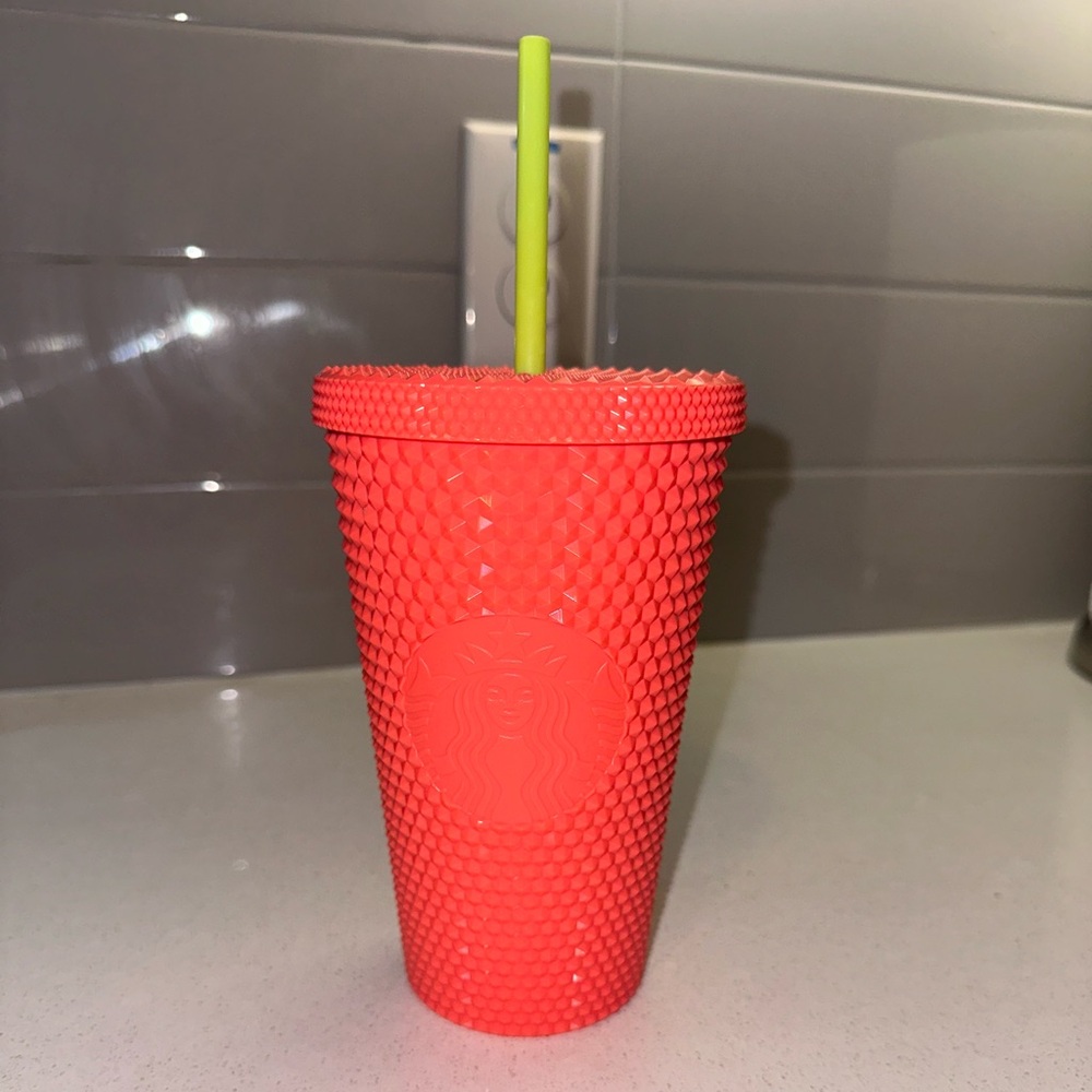 Grande reuseable Starbucks tumbler in dragonfruit colorway